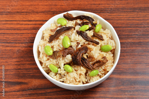 A bowl of porcino rice on the table