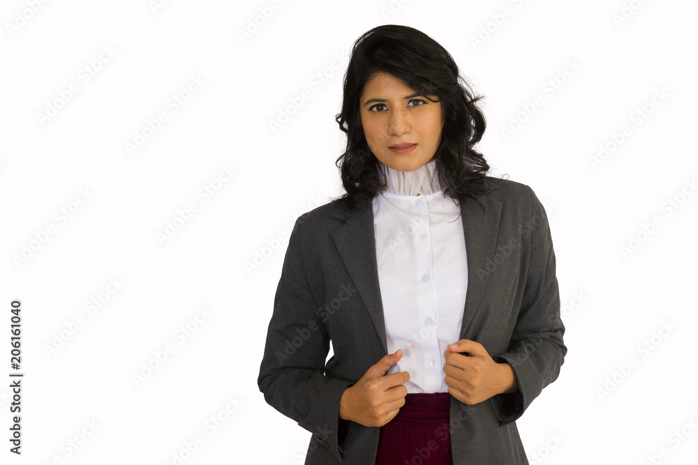 Stylish young woman in business suit looking at camera. Front pose