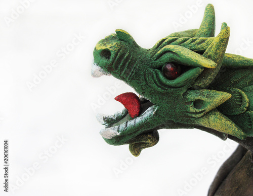 Figurine of a green dragon, open mouth