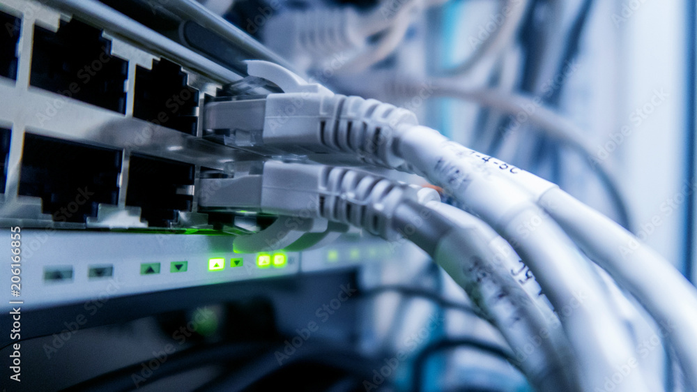 Network cables connected to switch. network hub. Network cables connected to switch. network hub.
