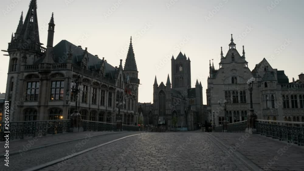 Static view of Ghent old town and churches from St Michael's Bridge. Taken during a spring morning twilight Static view of Ghent old town and churches from St Michael's Bridge. Taken during a spring morning twilight