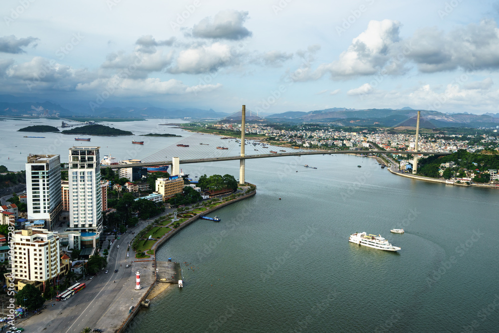Obraz premium Halong city aerial view with Bai Chay bridge in Quang Ninh province, Vietnam