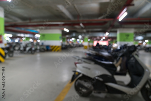Underground parking motorbike background blurred