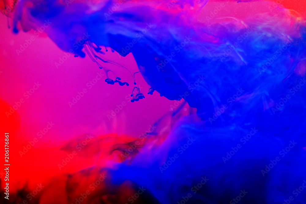 Acrylic colors and ink in water. Abstract frame background. Acrylic colors and ink in water. Abstract frame background.