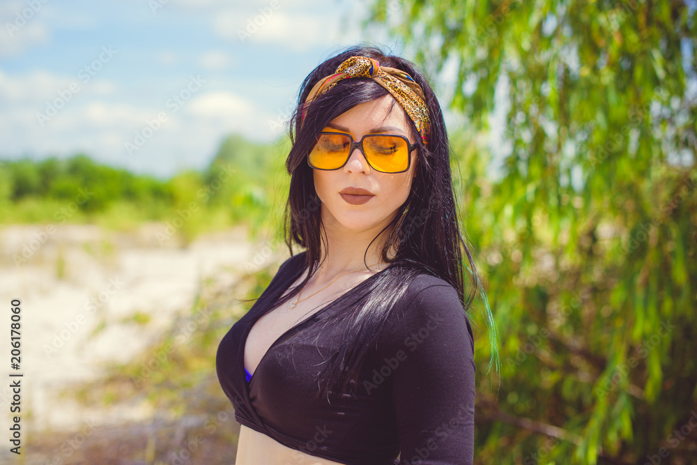 Beautiful woman with green hair posing in Indie or new Hippie style clothes . Outdoor fashion. Cute beautiful girl in boho style Beautiful woman with green hair posing in Indie or new Hippie style clothes . Outdoor fashion. Cute beautiful girl in boho style