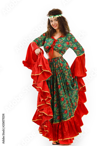 Pretty woman dancer with a gypsy dress