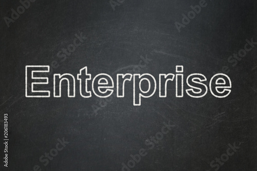 Finance concept: text Enterprise on Black chalkboard background