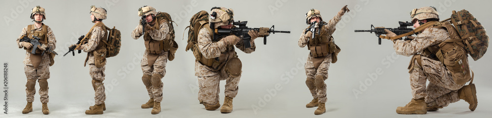 Soldier in camouflage holding rifle Soldier in camouflage holding rifle