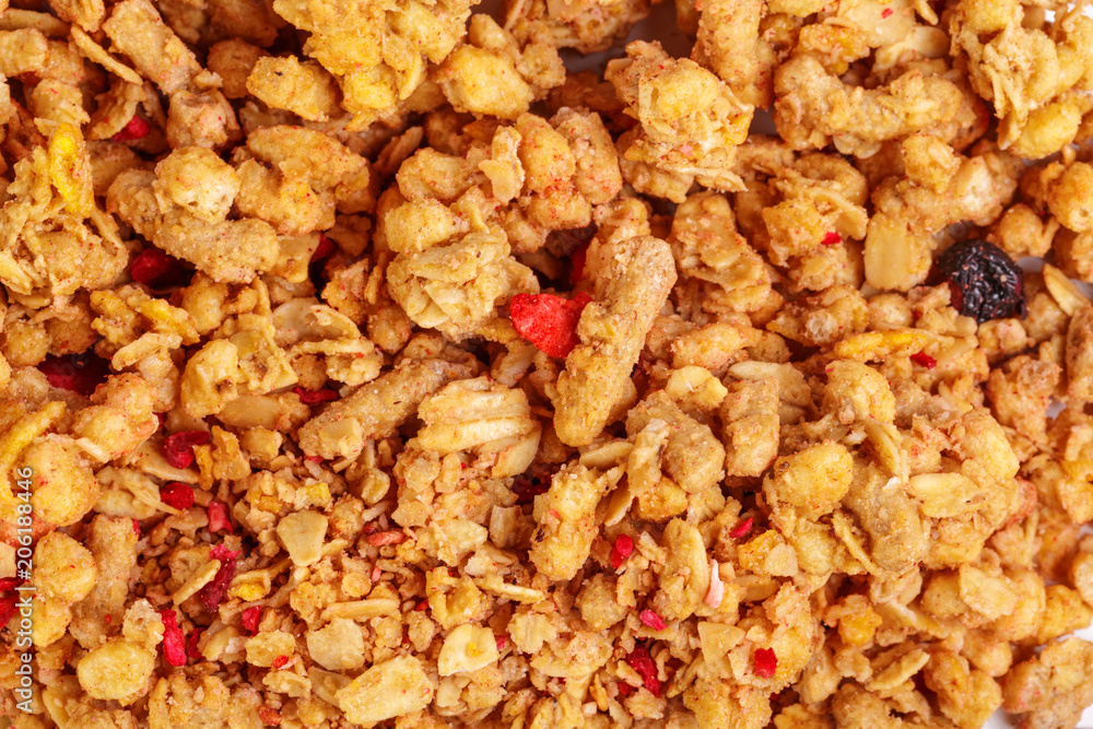 Homemade roasted granola on baking sheet breakfast food background Homemade roasted granola on baking sheet breakfast food background