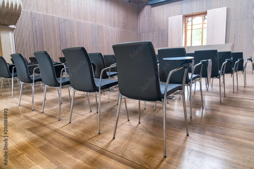 Row of chairs on a modern meeting room Row of chairs on a modern meeting room