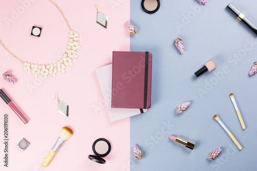Note book, woman beauty accessories flat lay on pastel background. Fashion or beauty blogger concept.