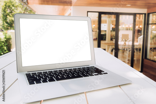 Modern computer,laptop with blank screen on white table with
