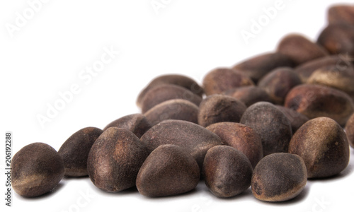 Pine nuts on white isolated background