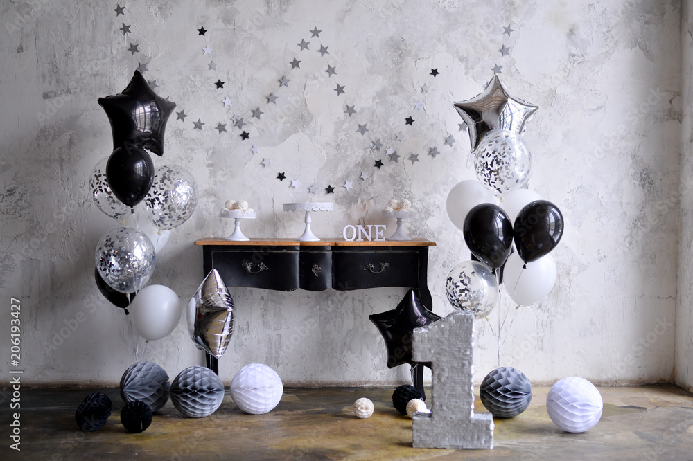Decorations foe holiday party. Birthday party black and white colors. A lot of balloons black ...