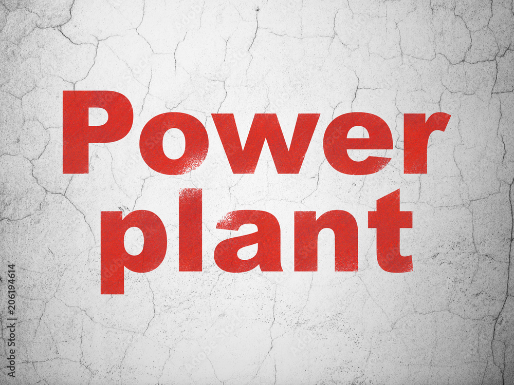 Manufacuring concept: Red Power Plant on textured concrete wall background Manufacuring concept: Red Power Plant on textured concrete wall background