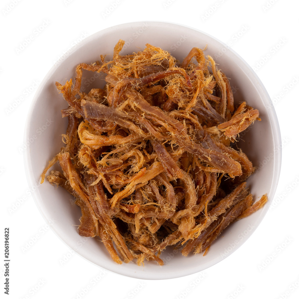 Dried shredded pork in a white bowl isolated on a white background Dried shredded pork in a white bowl isolated on a white background