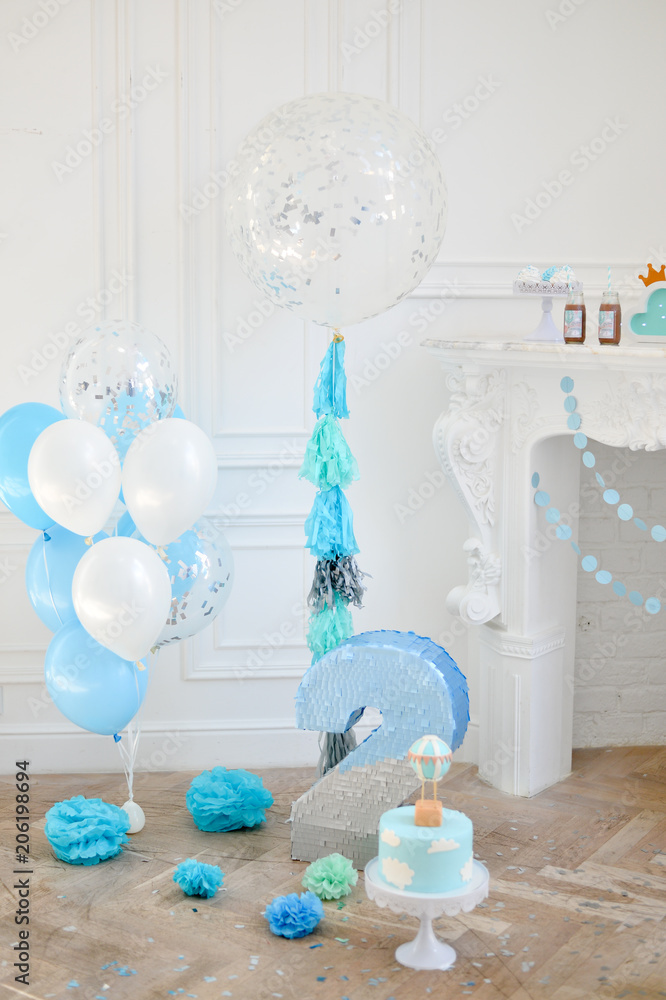 Two years birthday decorations. Decorations for birthday party. Blue and white balloons. Two years birthday decorations. Decorations for birthday party. Blue and white balloons.