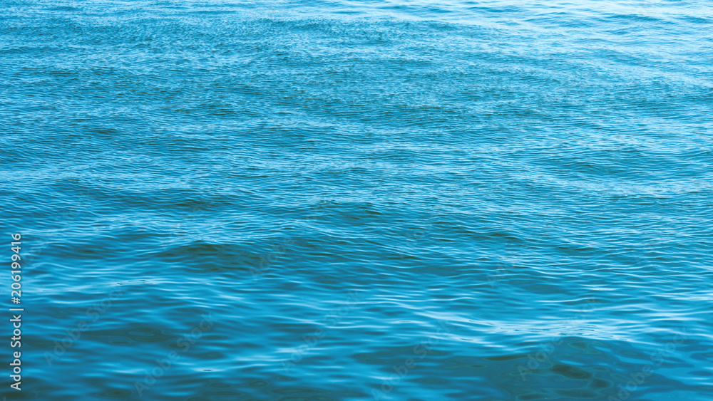 Sea surface as natural background, color toned. Sea surface as natural background, color toned.