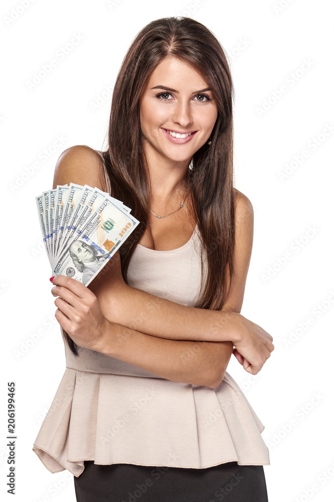 Smiling woman with us dollar money in hand over white background Smiling woman with us dollar money in hand over white background