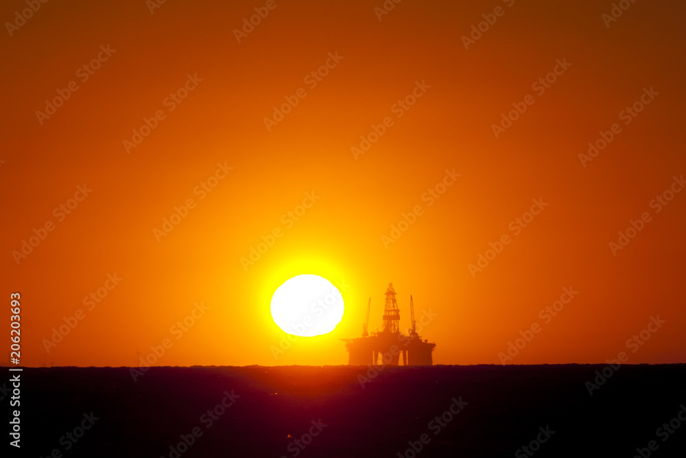 Ocean Oil Rig Sunset