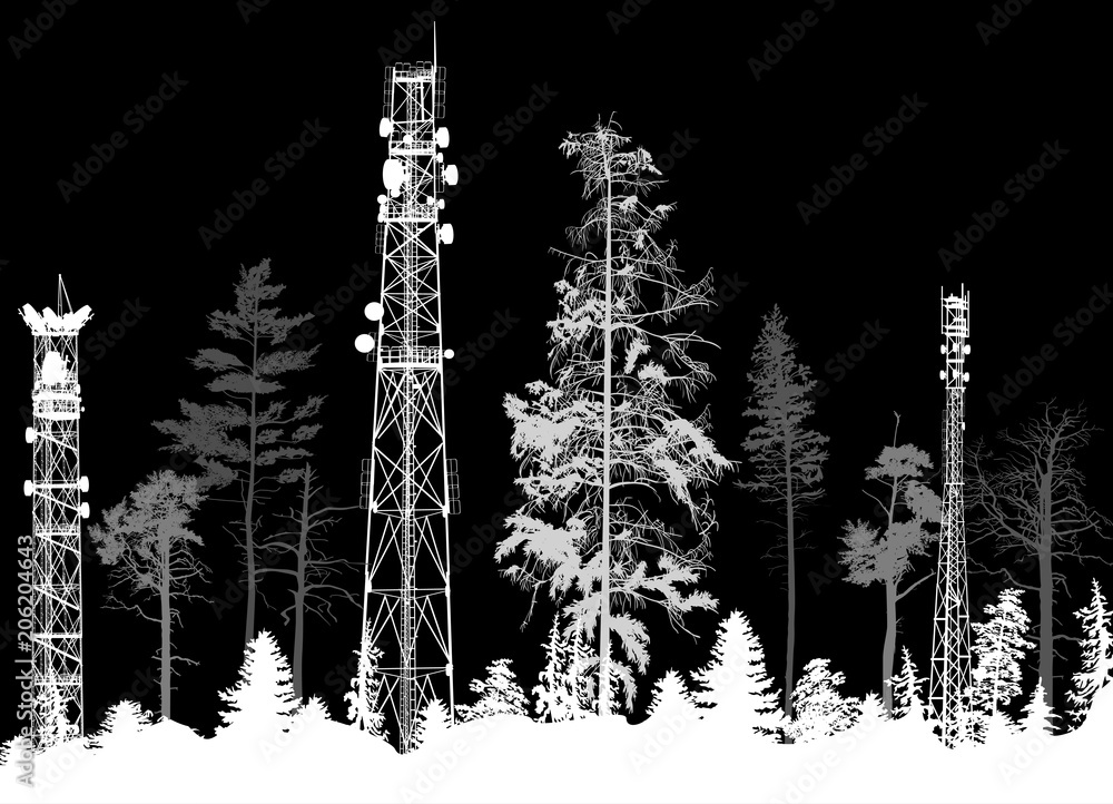 three electric towers in white forest