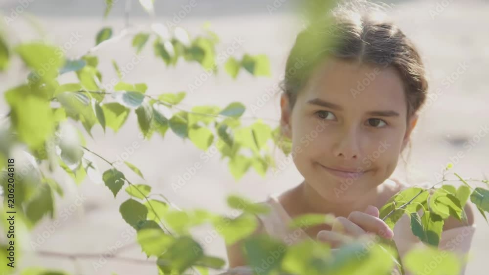 portrait beautiful little girl Russia twig birch tree leaves summer lifestyle slow motion video emotion portrait beautiful little girl Russia twig birch tree leaves summer lifestyle slow motion video emotion