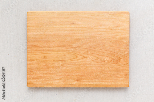 Cherry wood cutting board on linen, handmade wood cutting board	