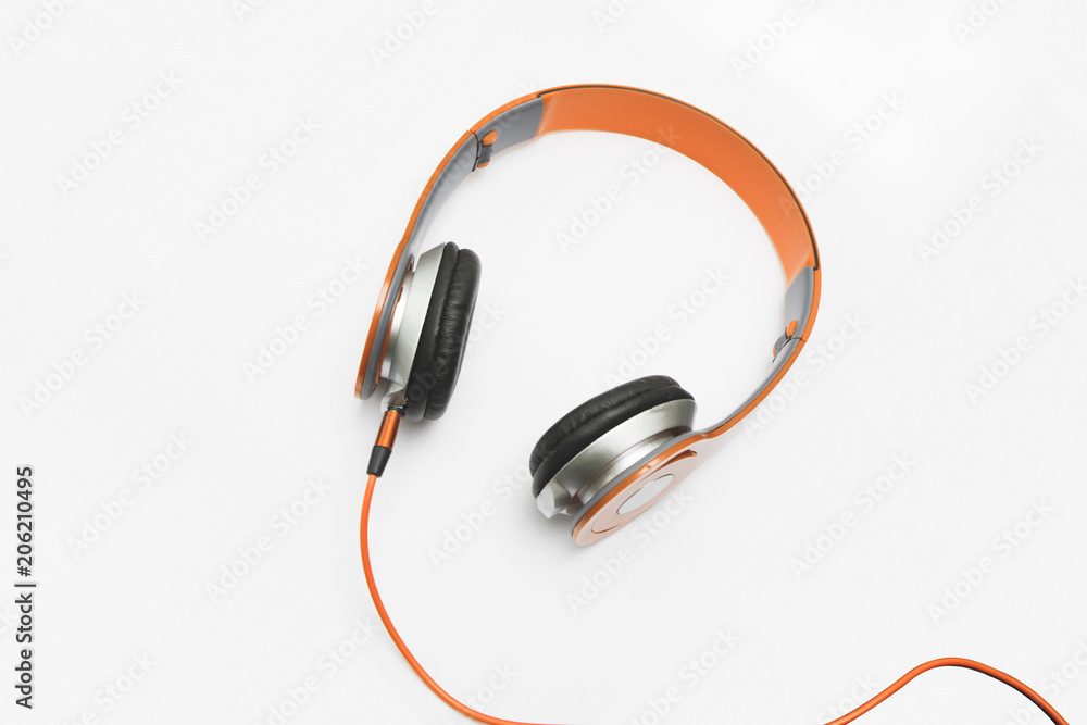 Orange headphone on white Orange headphone on white