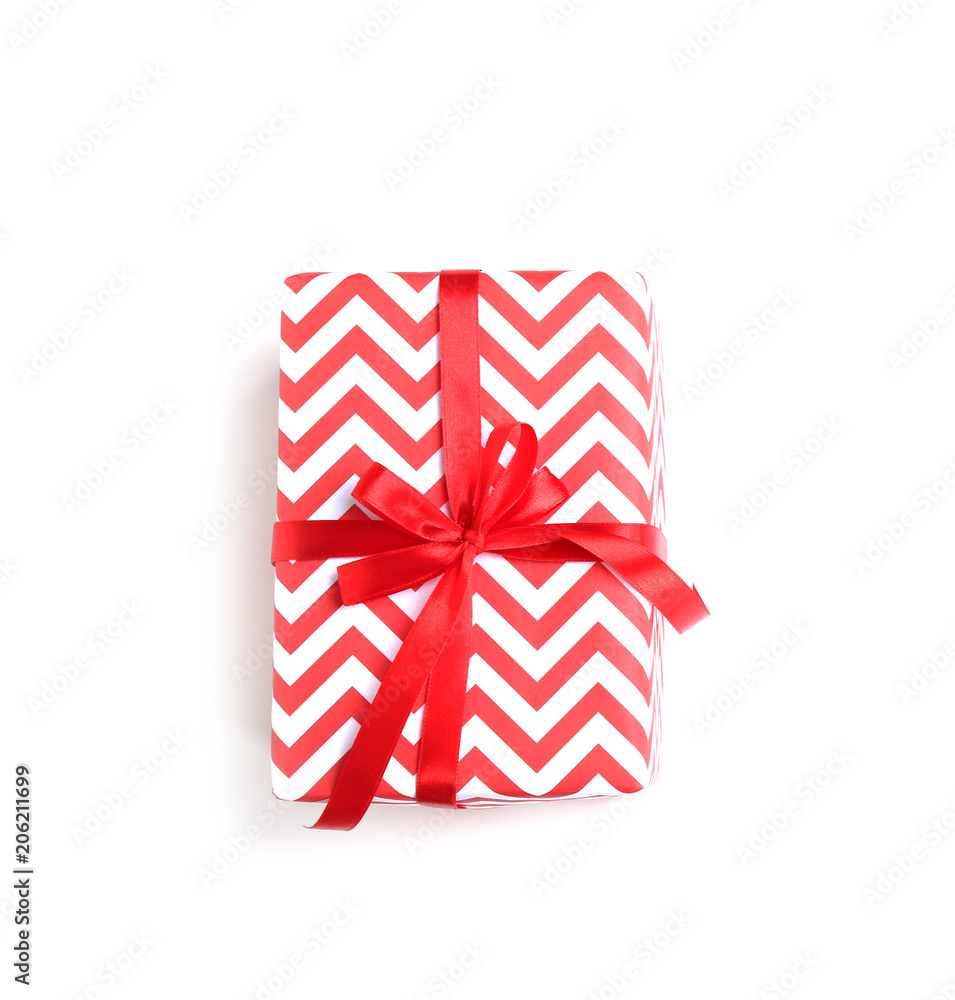 Beautifully decorated gift box on white background, top view Beautifully decorated gift box on white background, top view