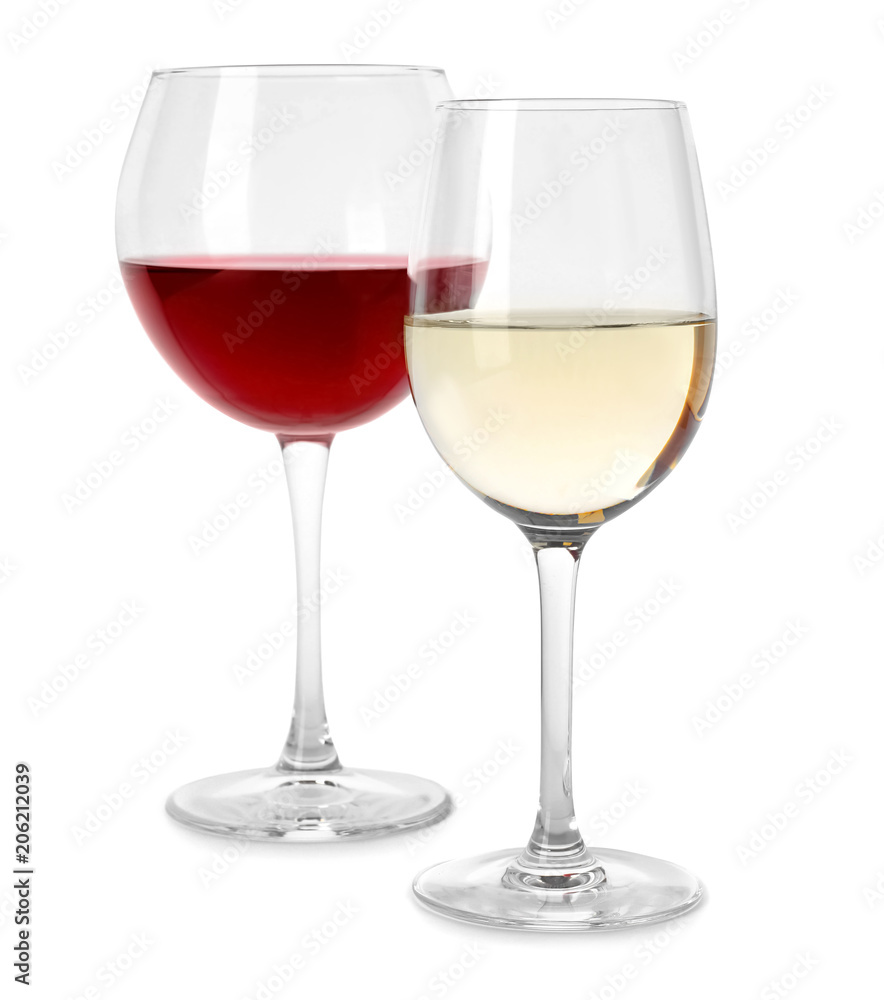 Glasses of expensive wines on white background