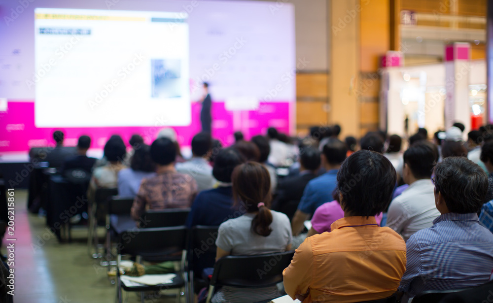 Audience at Conference Listening to Speaker Presenter Giving Talk at Meeting. Business Meeting in Conference Hall