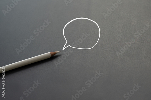 white color pencil share idea on black background with copy space