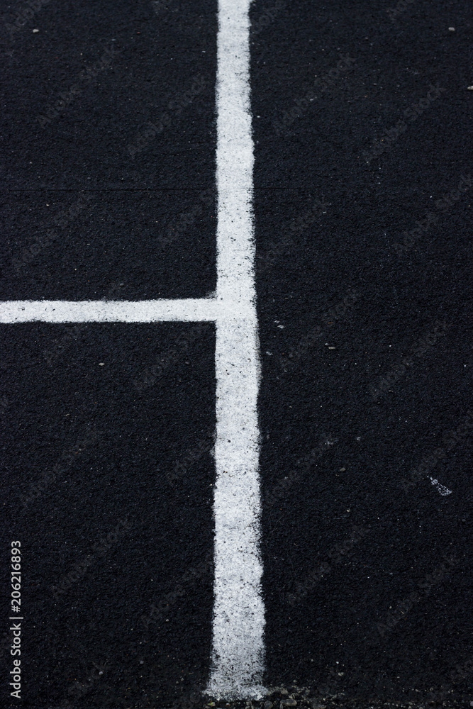 Lines on an asphalt field for sports