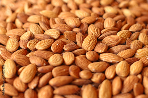 The almond on the counter of the store. Walnut background with soft focus.