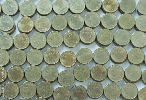 Golden coin on white background  Saving money concept.