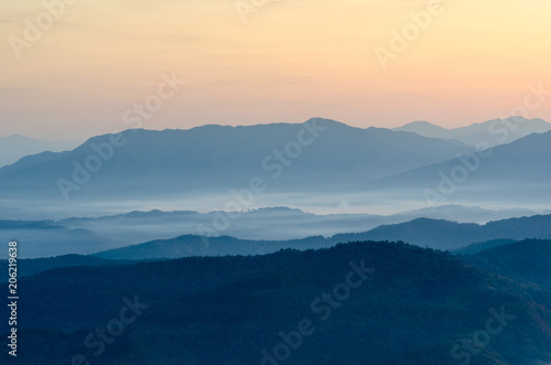 Beautiful clouds and fog among mountain landscape. © NIPATHORN