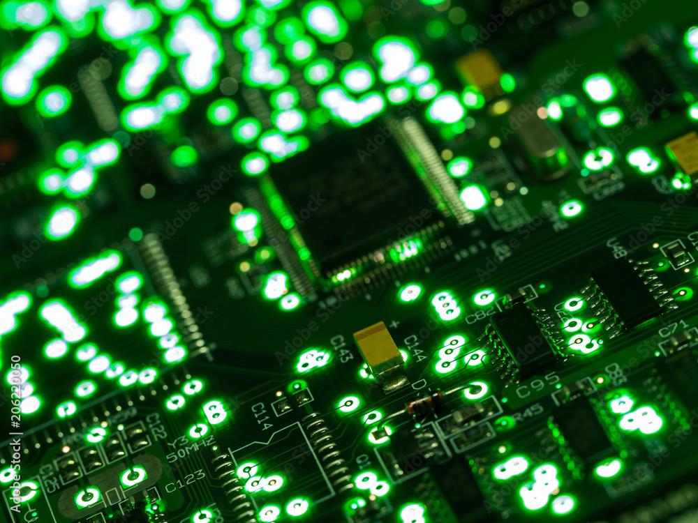 Obraz premium Abstract background,close up green circuit board. Electronic computer hardware technology. Main board computer background. Integrated communication processor. Information engineering component.