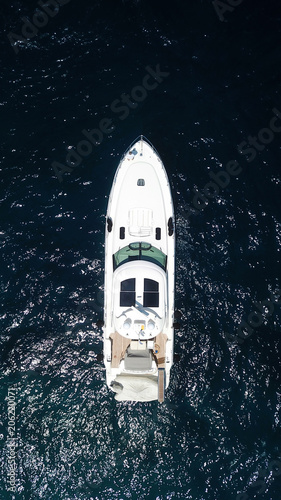 Aerial drone bird's eye view photo of luxury sail boat cruising in crystal clear waters of Ionian sea, Ionian islands, Greece © aerial-drone
