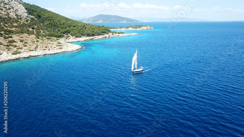 Aerial drone bird's eye view photo of luxury sail boat cruising in crystal clear waters of Ionian sea, Ionian islands, Greece