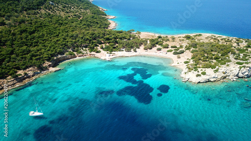 Aerial drone bird's eye photo of tropical paradise island beach with emerald crystal clear waters © aerial-drone
