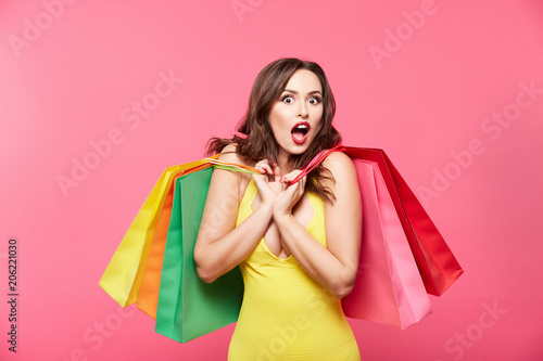Happy girl doing shopping
