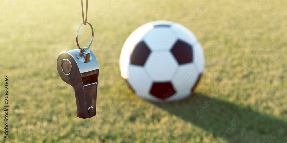 Naklejka premium Trillerpfeife und Fußball