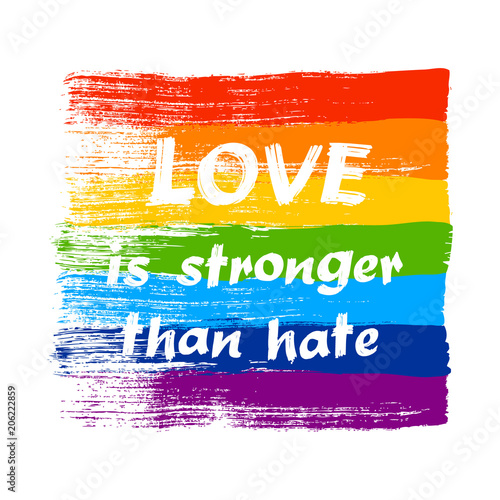 Love is stronger than hate - LGBT pride slogan against homosexual discrimination. Modern calligraphy on rainbow grunge flag. Vector illustration.