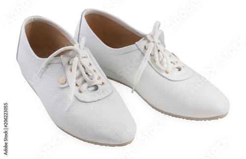 Pair of women's sport shoes isolated on a white background, close up.