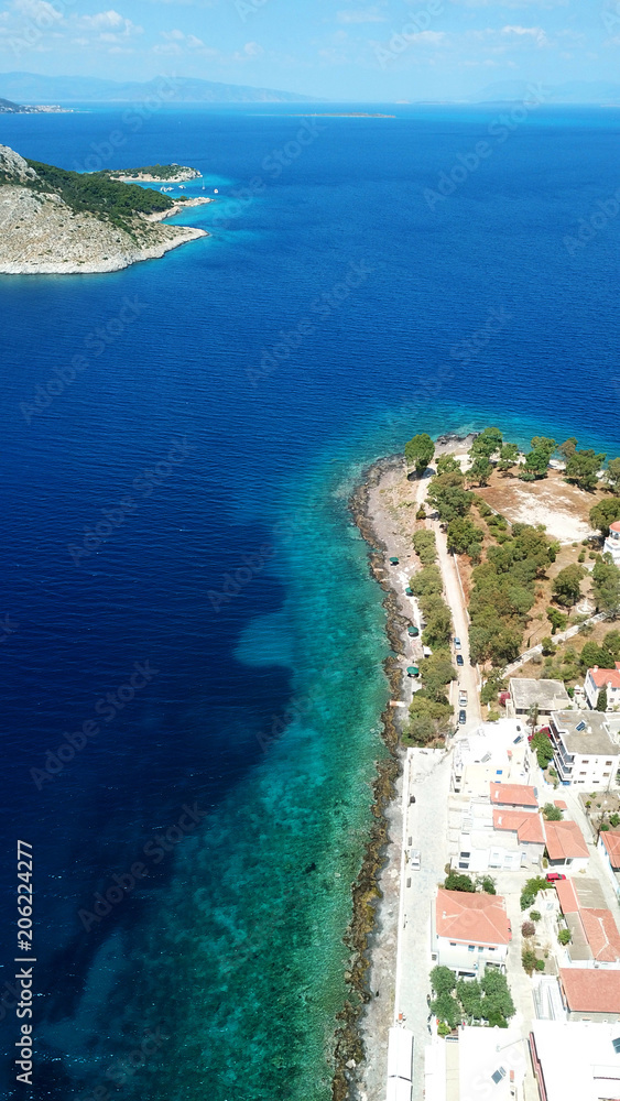 Aerial drone bird's eye view photo of port and traditional fishing village of Perdika in island of Aigina, Saronic Gulf, Greece
