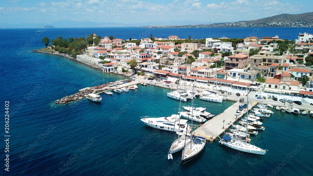 Aerial drone bird's eye view photo of port and traditional fishing village of Perdika in island of Aigina, Saronic Gulf, Greece