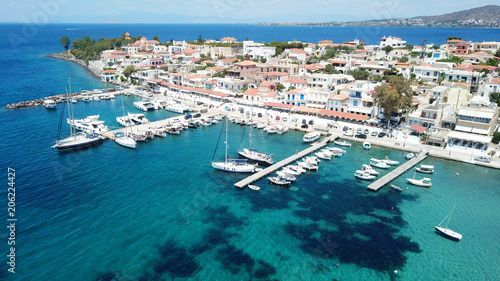 Aerial drone bird's eye view photo of port and traditional fishing village of Perdika in island of Aigina, Saronic Gulf, Greece photo