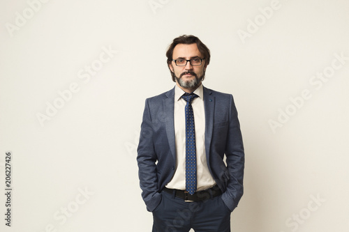Handsome confident bearded businessman portrait