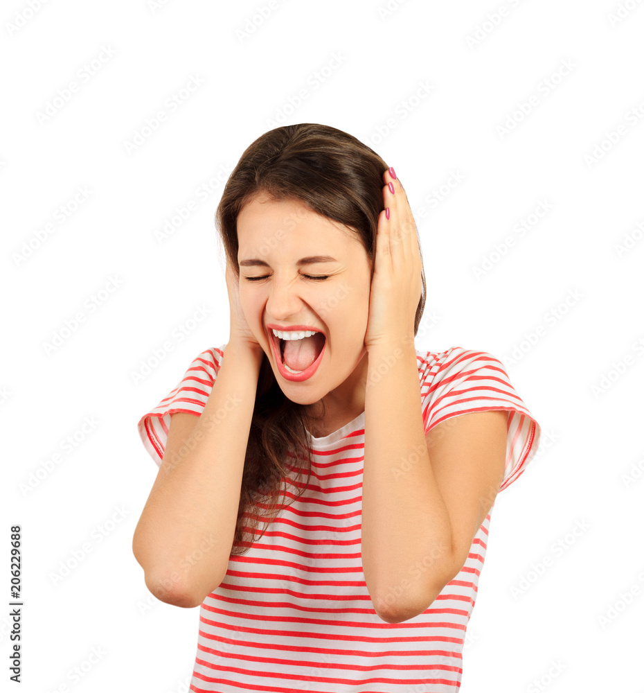 Portrait of screaming female face squeeze her ears by hand. emotional girl isolated on white background Portrait of screaming female face squeeze her ears by hand. emotional girl isolated on white background