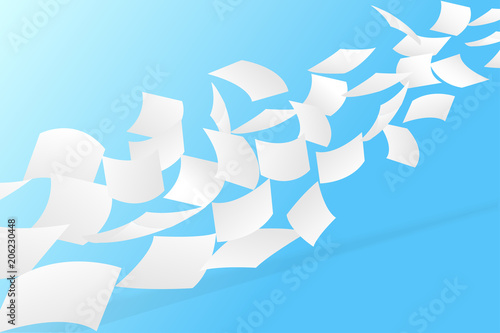 white papers flying on blue sky background.